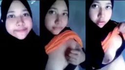 Gadis Berjilbab Pamer Payudara Montok Yang Menggoda