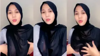 Tante Jilbab Hitam, Tubuh Mulus Kebayang Jelas Lewat Baju Transparan.